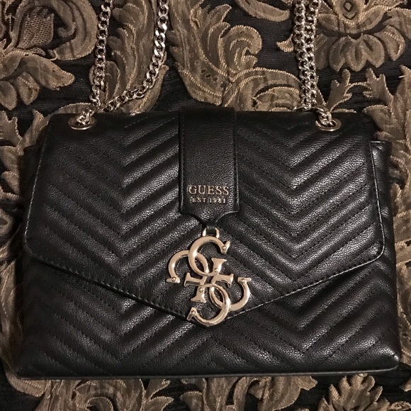 black and gold guess bag